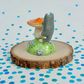 Gray Tuxedo on an Orange Mushroom
